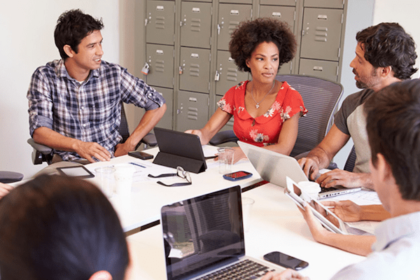 coworkers working around a table