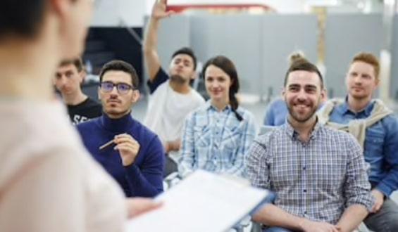 group of people in training session and engaging with the instructor