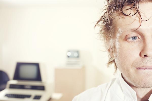 Stressed and sweaty man in office environment