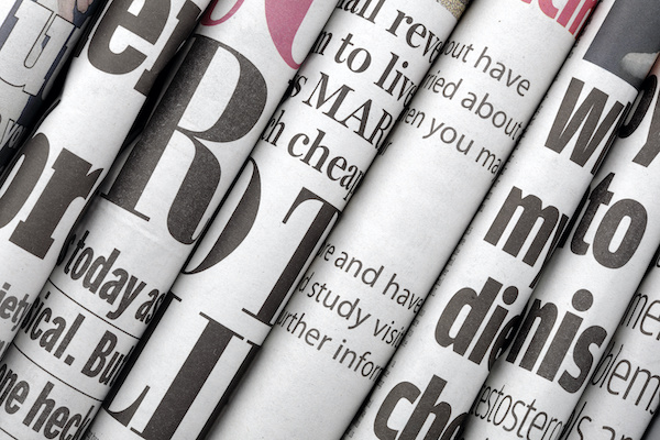 folded up rows of newspapers