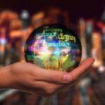 hand holding globe with values on it
